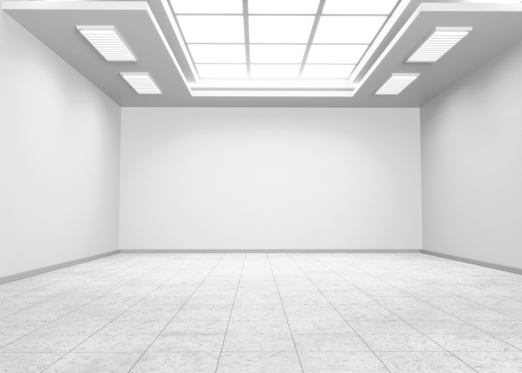 white empty room. no windows. no doors. skylights and fluorescent lights as only light source. No switches, no plugs. A bare room